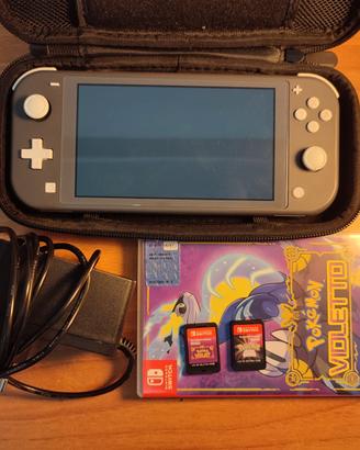 Nintendo switch lite e due giochi Pokemon