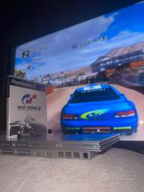 PlayStation 2 Slim (Satin Silver) + Lotto 5 Giochi