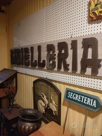 insegna Gioielleria su pannello legno