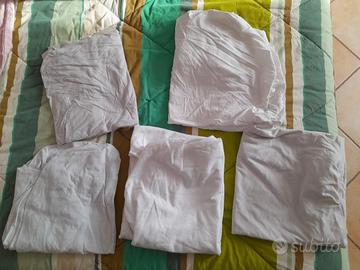 Lenzuola bianche con angoli per lettino