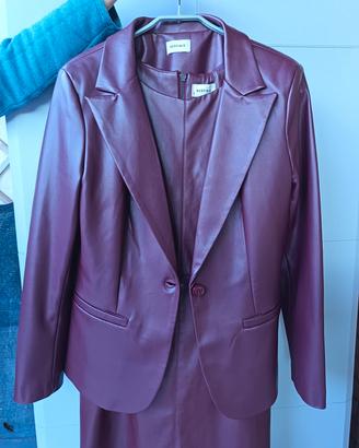 Giacca e vestito coordinati in finta pelle