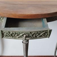 Antica piccola consolle in lega  con piano legno.