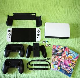 Nintendo switch Oled + 2 giochi + accessori