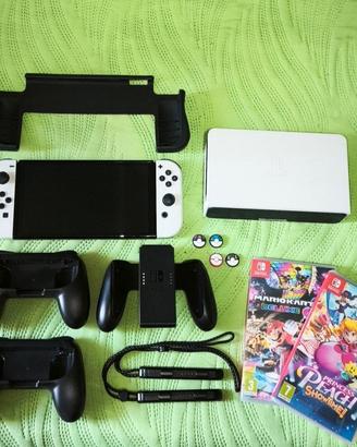 Nintendo switch Oled + 2 giochi + accessori