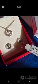 Parure guess con etichetta collana orecchini gg id