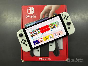 Nintendo Switch OLED bianca + Accessori + Giochi