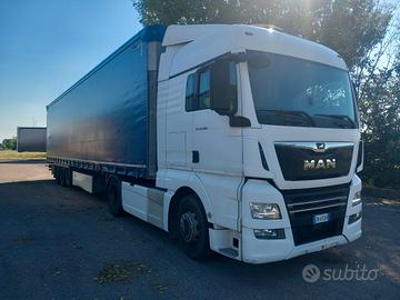 MAN TGX 500 + Semirimorchio  SCHMITZ  varios