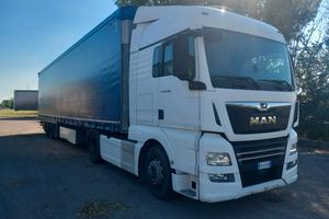 MAN TGX 500 + Semirimorchio  SCHMITZ  varios