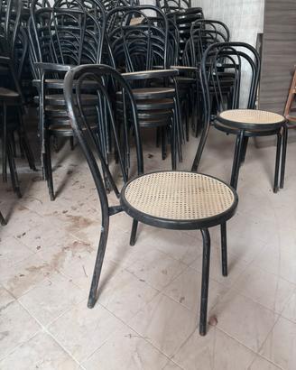 stock sedie stilethonet in metallo nero e paglia d