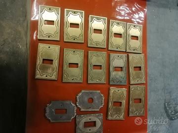 placche ottone vintage interruttori