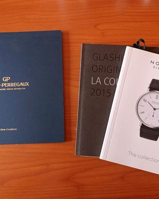 Cataloghi orologi: Zenith, Chopard, Nomos e altri.