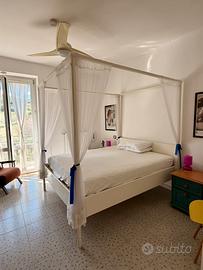 Letto a baldacchino