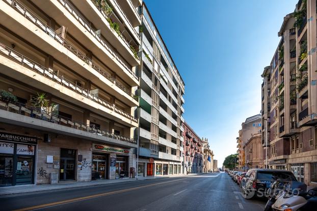 Ampio quadrivano con terrazza e posto auto