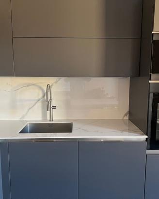 Aredo cucina e camera di letto