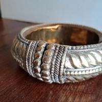 svuotatasche realizzato con bracciale da schiavo