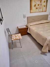 Appartamento sul mare con posto auto e giardino