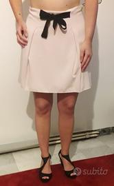 Gonna rosa con fiocco Motivi