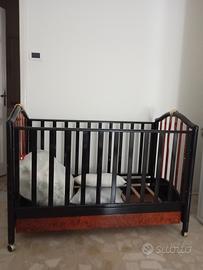 culla di legno nera e radica di olmo 