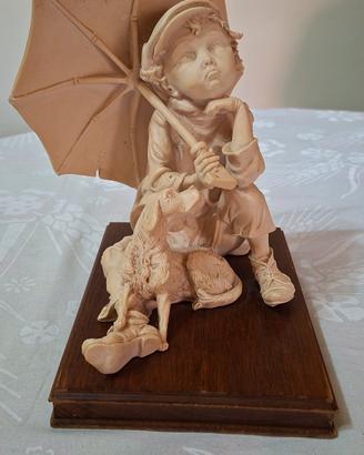 Statua di Giuseppe Armani - "Give A Dog A Bone"
