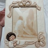 Cornice Thun con angelo
