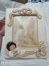 Cornice Thun con angelo