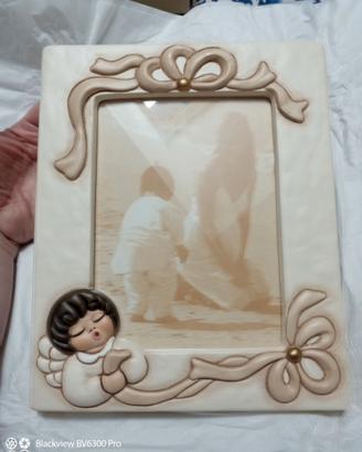 Cornice Thun con angelo