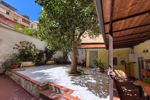 MATERDEI stanza matrimoniale con giardino