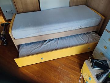 letto singolo con comodino 