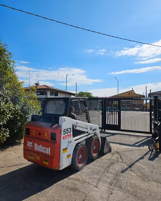 P182- Mini Pala 18 q Bobcat 553