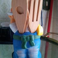 Chef con mini posate in legno