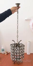 Lampadario vintage in bronzo e cristallo.