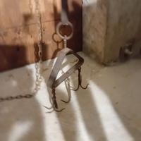 Gancio antico da pozzo