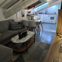 divano angolare velluto grigio 