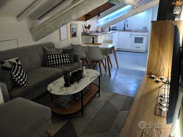 divano angolare velluto grigio 