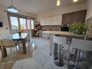 PORZIONE DI BIFAMILIARE A BOSCONERO