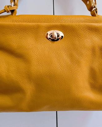 Borsa da donna vera pelle color giallo senape.