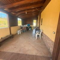 Terreno con casa