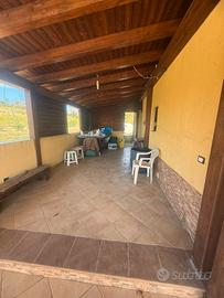 Terreno con casa