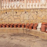 15 vasi in plastica e sottovasi prezzo 30