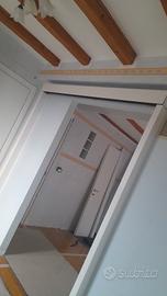 PORTA SCORREVOLE BIANCA CON DUE ANTE