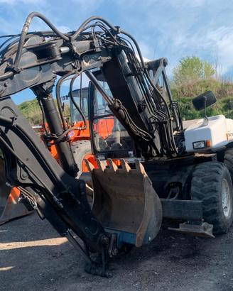 escavatore gommato MECALAC 12MXT 