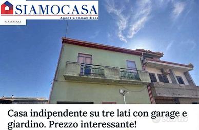 Casa di circa 200 mq con giardino e garage