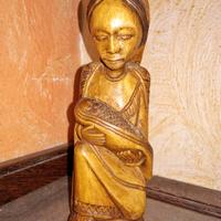 Donna con bambino arte africana.