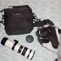 Canon 1100d con obbiettivo e teleobbiettivo