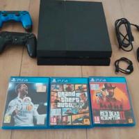 PlayStation 4 + 3 giochi + 2 joystick