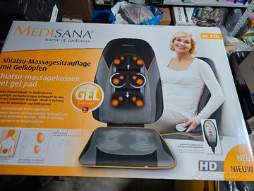 Massaggio shatzu . Coprisedile Medisana