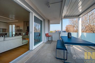 Attico a ridosso del centro città, con vista a 36