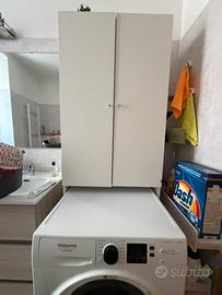 Mobiel sopra lavatrice