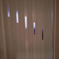 porta soffietto a vetri