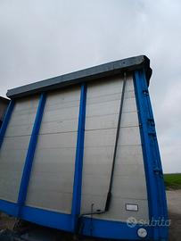 copri scopri rimorchio 